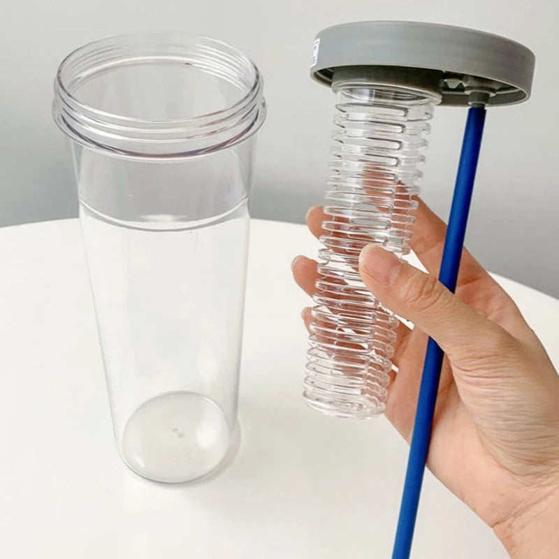 Gourde en verre avec paille